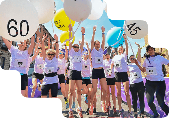 Smiling woman using her phone to start charity fundraising in Ireland with iDonate, a GoFundMe alternative